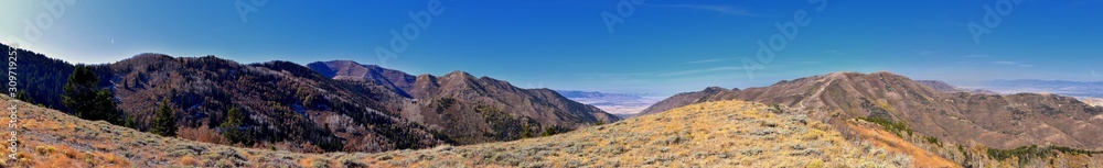 Landscape views of Tooele from the Oquirrh Mountains hiking and backpacking along the Wasatch Front Rocky Mountains, by Kennecott Rio Tinto Copper mine, by the Great Salt Lake in fall. Utah, America.