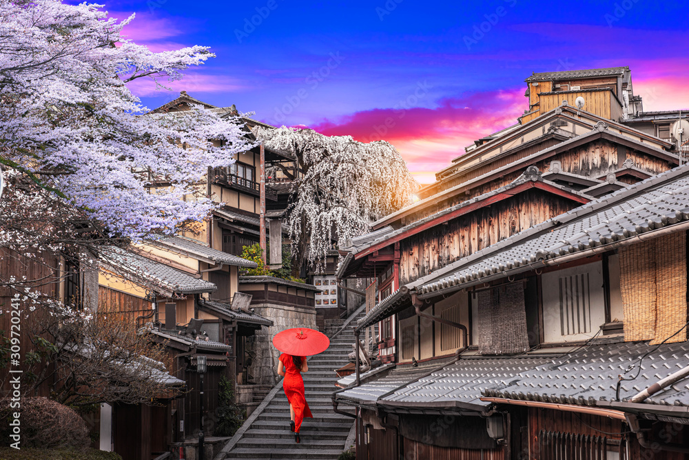  Asian  Woman Wearing Cheongsam Traditional Red Dress visit  Historic Higashiyama district, Kyoto in Japan.