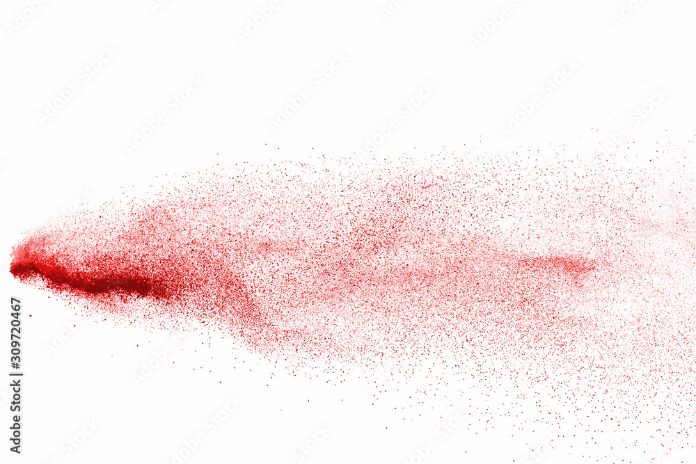 Explosion of red powder on black background Explosion of red powder on black background