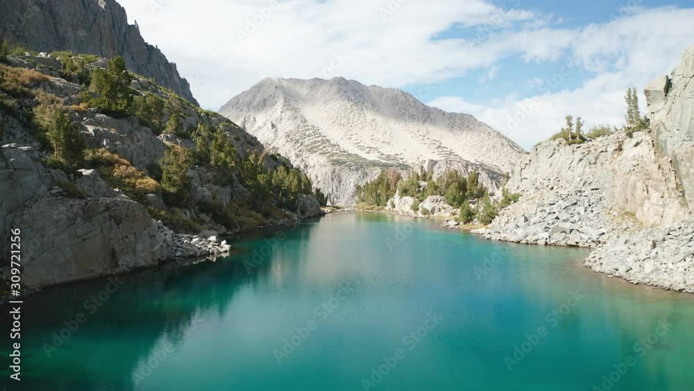 Aerial scenic shot over alpine lake in Eastern Sierra mountain range, California Aerial scenic shot over alpine lake in Eastern Sierra mountain range, California