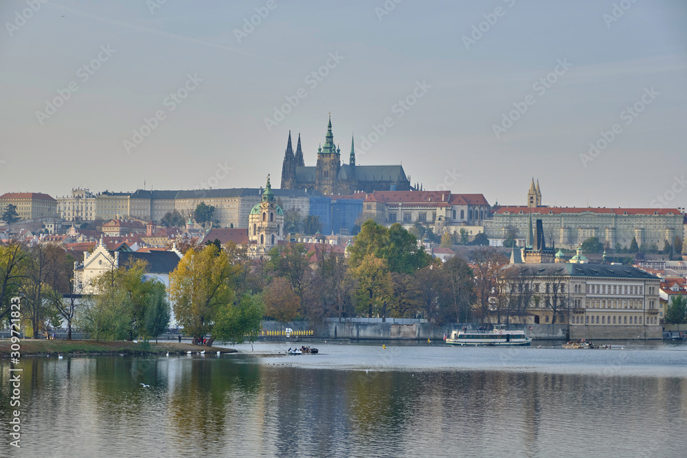 Scenic panorama with Prague Castle (Prazsky hrad) and Vlatva river in capital of Czech Republic Prague. Beautiful summer sunny cityscape of the biggest city of Czechia