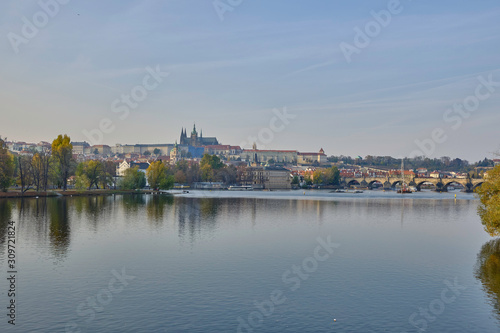 Scenic panorama with Prague Castle (Prazsky hrad) and Vlatva river in capital of Czech Republic Prague. Beautiful summer sunny cityscape of the biggest city of Czechia
