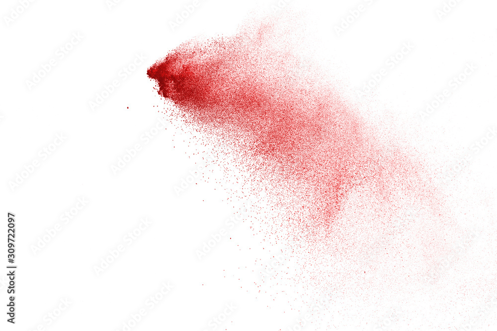 Fototapeta premium Explosion of red powder on black background