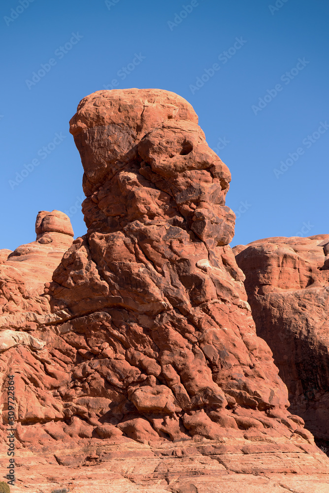 Bearded man with a hat rock formation
