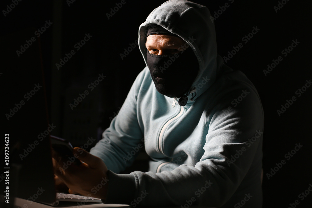 Man carder in mask connect to darknet Man carder in mask connect to darknet