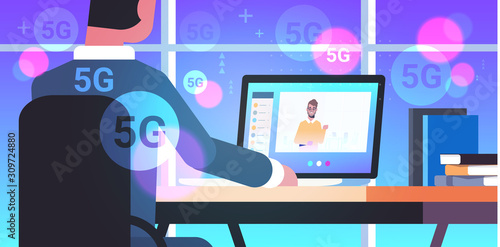 businessman making video call with guy social network communication 5G online wireless system connection concept business man sitting at workplace using laptop portrait rear view horizontal vector