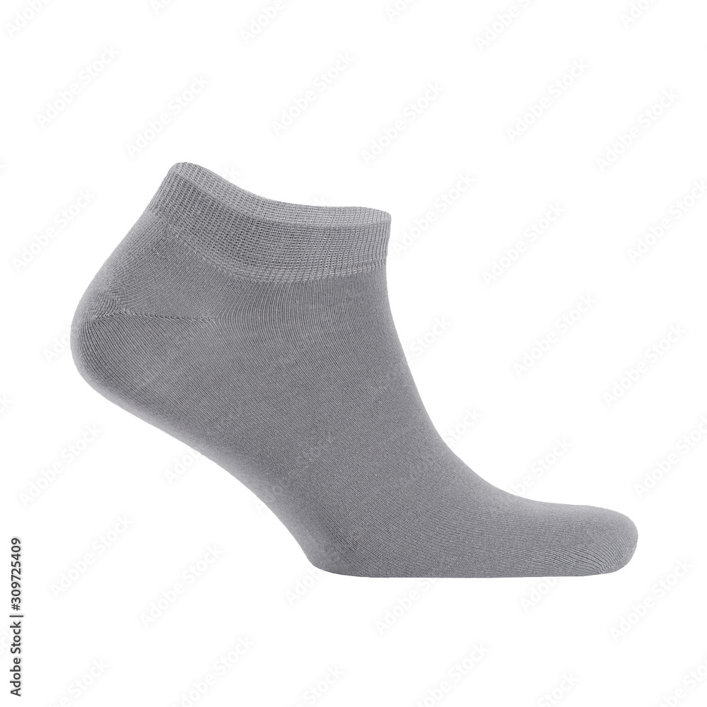 Blank grey cotton sport short sock on invisible foot isolated on white background as mock up for advertising, branding, design, side view, template. Blank grey cotton sport short sock on invisible foot isolated on white background as mock up for advertising, branding, design, side view, template.