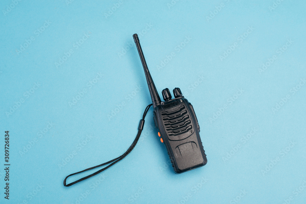 walkie-talkie isolated on blue background. Communication system. place for  text. isolate. Photos | Adobe Stock