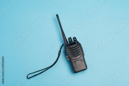 walkie-talkie isolated on blue background. Communication system. place for text. isolate. photo