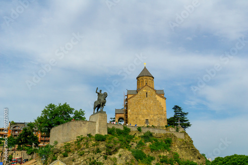 Metekhi St. Virgin Church and King Gorgasali Statue over Kura river, Tbilisi, Georgia