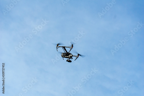 flying drone with camera on the sky