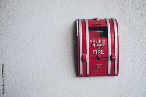 fire alarm switch on wall. Electrical Conduit & PVC Conduit. Closed-up of Fire alarm