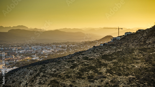 Construction site with crane. Spanish coast.