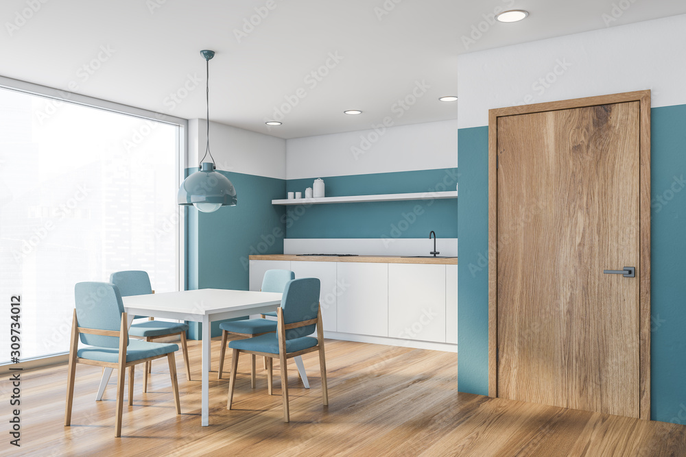 Blue kitchen interior with countertops and table Blue kitchen interior with countertops and table