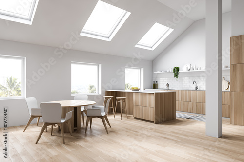 Attic white kitchen corner bar and dining table © ImageFlow
