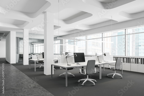 Panoramic white open space office with columns