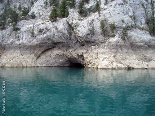 cave in a mountain lake