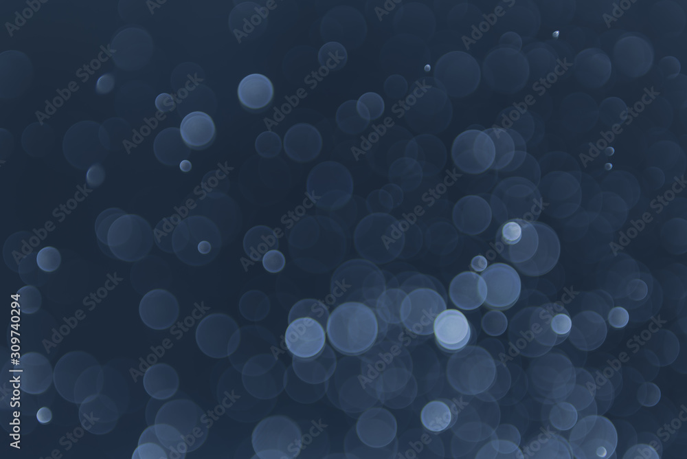 abstract sparkle bokeh light effect with navy blue background abstract sparkle bokeh light effect with navy blue background