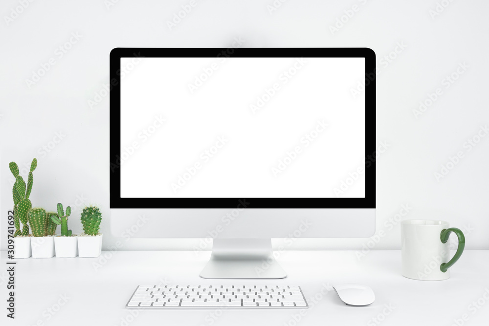 Computer with blank white copy space for text, Mockup design desktop computer in office on white table with keyboard and Coffee cub, Work place concept, Cactus in pot. Computer with blank white copy space for text, Mockup design desktop computer in office on white table with keyboard and Coffee cub, Work place concept, Cactus in pot.