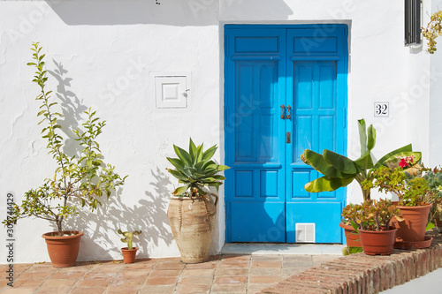 front house door in spain with planters