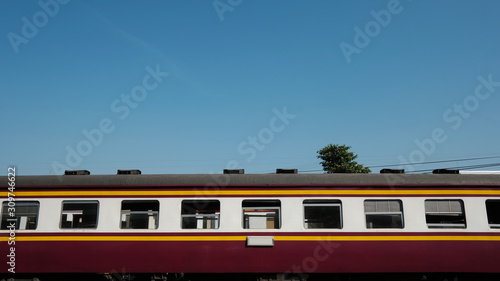 The Train car with the clear blue sky at Thonburi Railway Station in Bangkok Thailand