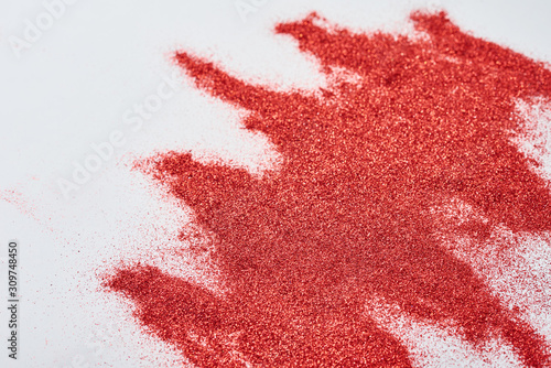 Abstract texture. A red glitter background