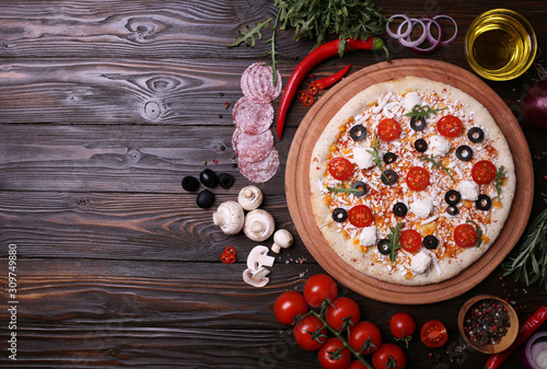 Italian pizza with the best products, with tomatoes, mozzarella cheese, mushrooms and olives