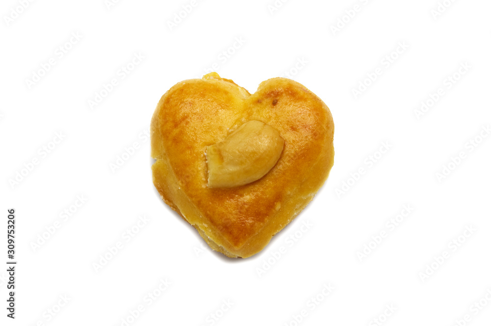 Cashew nut or Singapore cookies of heart shape isolated on white background for valentine's day or other celebration element concept design. Cashew nut or Singapore cookies of heart shape isolated on white background for valentine's day or other celebration element concept design.