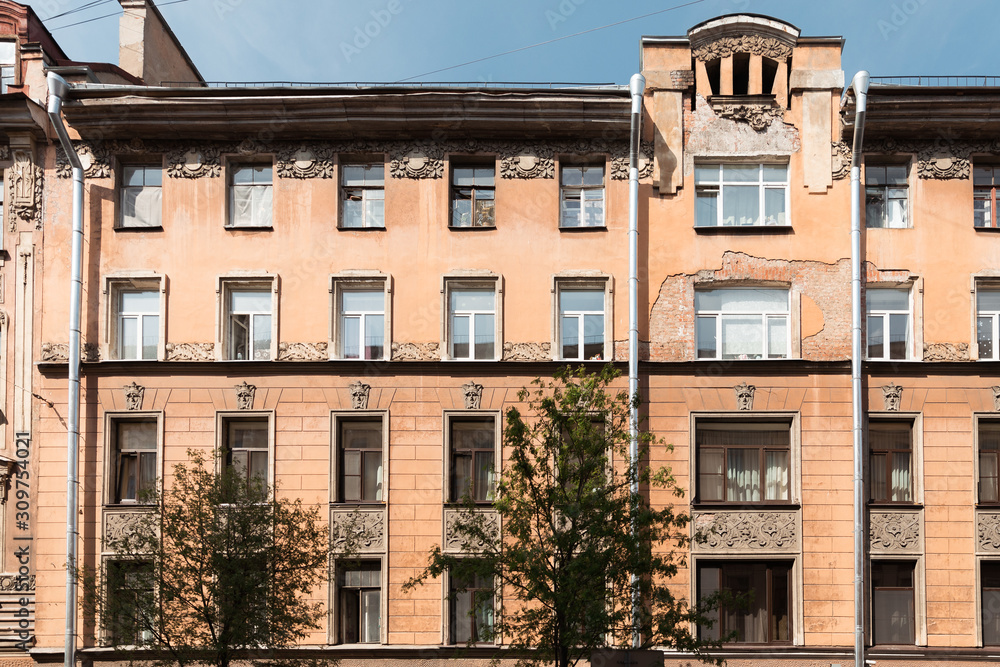 Naklejka premium Vintage design windows on the facade of the old house. Architectural, elegance.