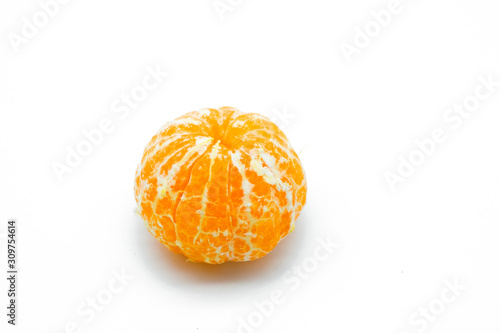 Ripe tangerine manderin peeled off isolated on white background