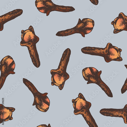 Vector Illustration seamless pattern with hand drawn cloves on blue background. Spice culinary pattern with clove seed. Herbal ingredients for kitchen or package design