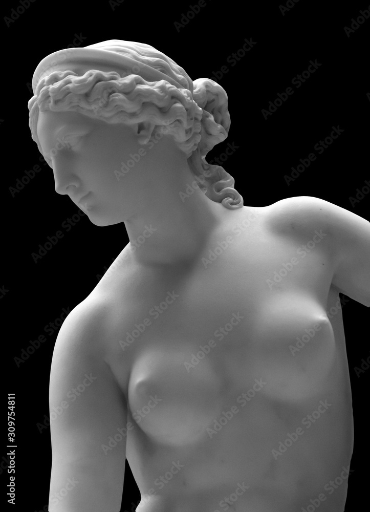 Fototapeta White marble sculpture head of young woman. Statue of sensual renaissance art era naked woman in circlet antique style isolated on white background