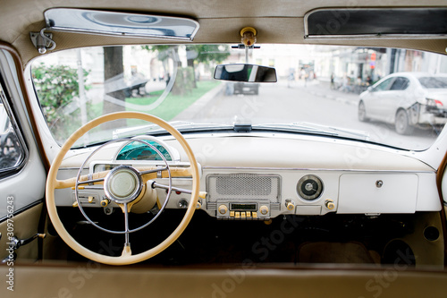 Driver's cockpit of a classic car. Old car interior 
