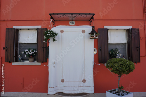 WIndows and door, orange fasade
