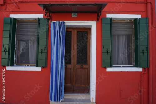 Windows and door, red fasade