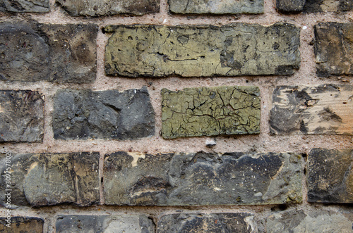 brick wall. old ruined building. Building ready to be demolished. Texture. Empty background.