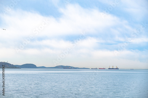 Vladivostok, Russia - May 07, 2019: Ship on the roadstead in the Amur Bay. © rdv27