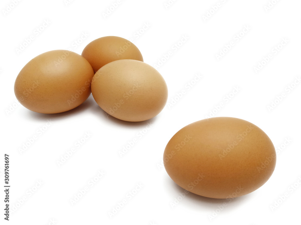 Raw fresh brown chicken eggs isolated on white background. Raw fresh brown chicken eggs isolated on white background.