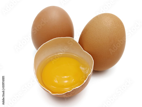 Raw fresh brown chicken eggs isolated on white background.