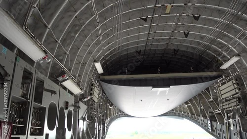 Slow Left To Right Pan Inside Military Aircraft For Carrying Troops And Cargo