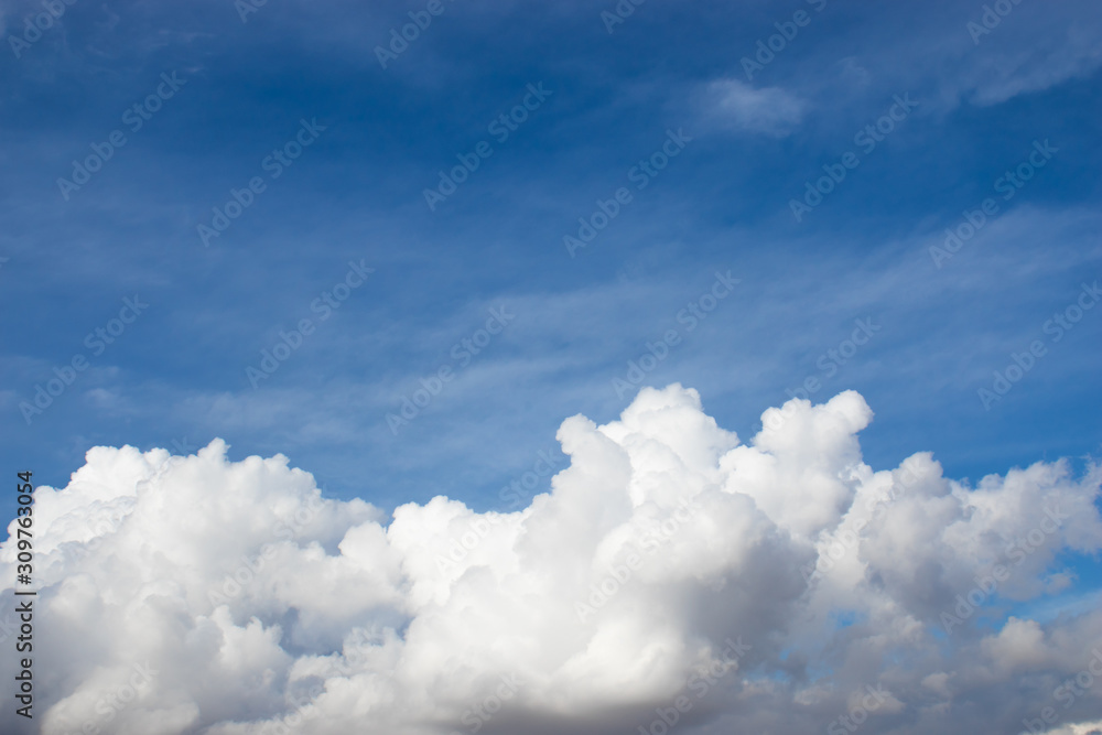 Blue sky background with big fluffy clouds Blue sky background with big fluffy clouds