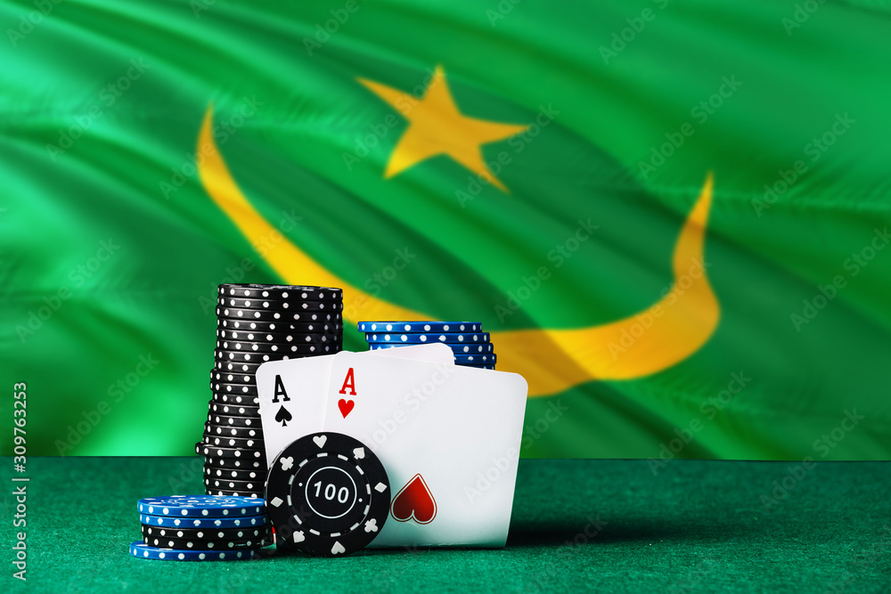 Mauritania casino theme. Two ace in poker game, cards and black chips on green table with national flag background. Gambling and betting.