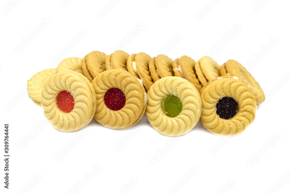 Biscuit sandwich butter cookies with cream and mixed fruits flavoured jam. A stack of crunchy delicious sweet meal and useful cracker. isolated on white background. Soft focus. Biscuit sandwich butter cookies with cream and mixed fruits flavoured jam. A stack of crunchy delicious sweet meal and useful cracker. isolated on white background. Soft focus.