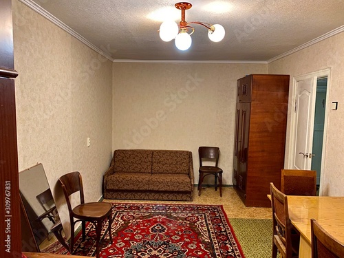 Old soviet living room with carpet