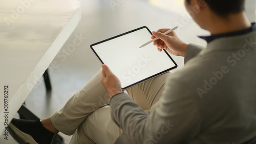Business people feel comfortable using tablet blank screen.