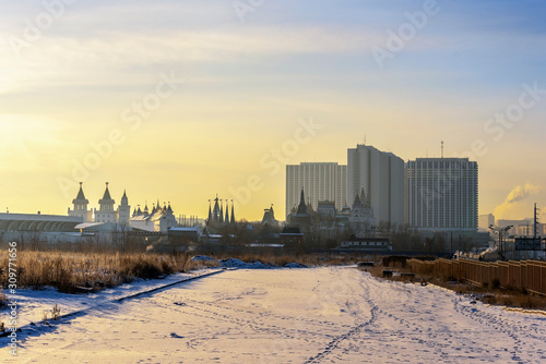 Cityscape on a frosty winter morning in backlight