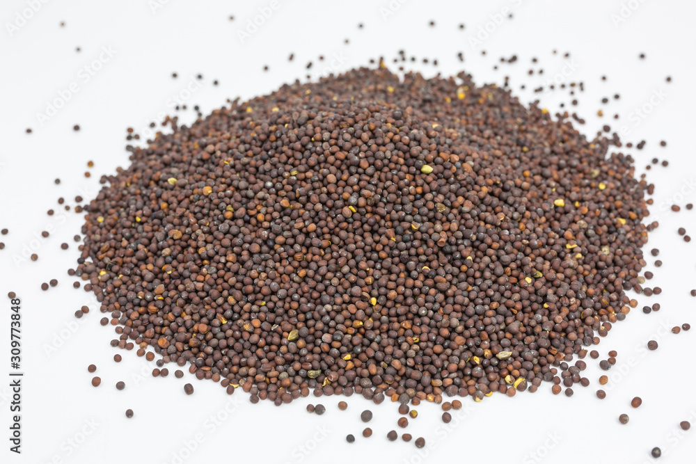 heap of brown mustard seeds heap of brown mustard seeds