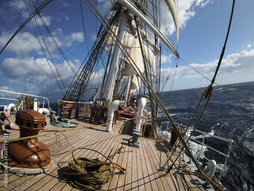 open ocean sailing on a squarerigger tallship sailing vessel, unique perspective photo