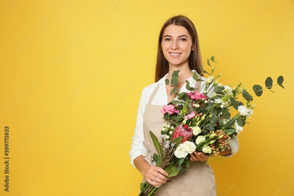 Florist with beautiful bouquet on yellow background, space for text Florist with beautiful bouquet on yellow background, space for text