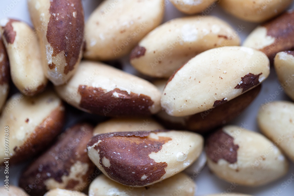 Brazil nuts on white marble background Brazil nuts on white marble background